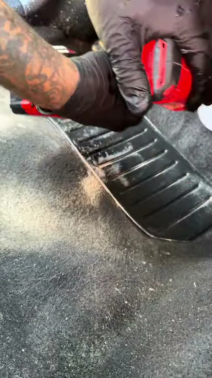 Rod Shine extracting dirt from vehicle carpet
