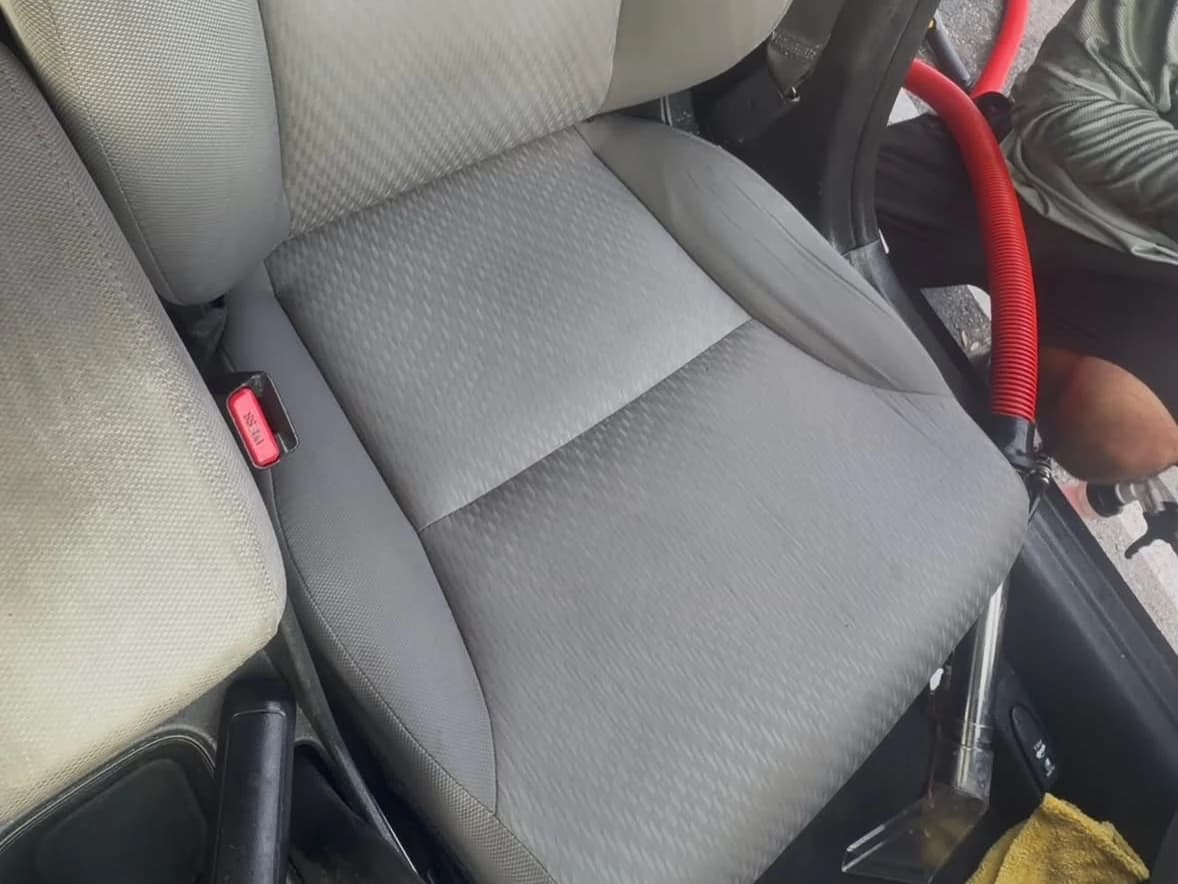 The Honda driver seat clean after Rod Shine detailing