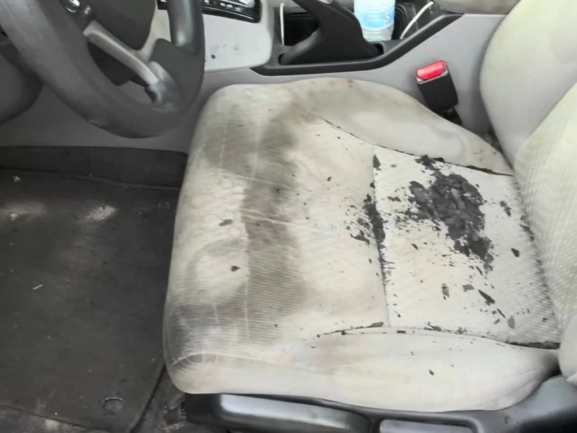 Heavily soiled Honda driver seat before Rod Shine detailing