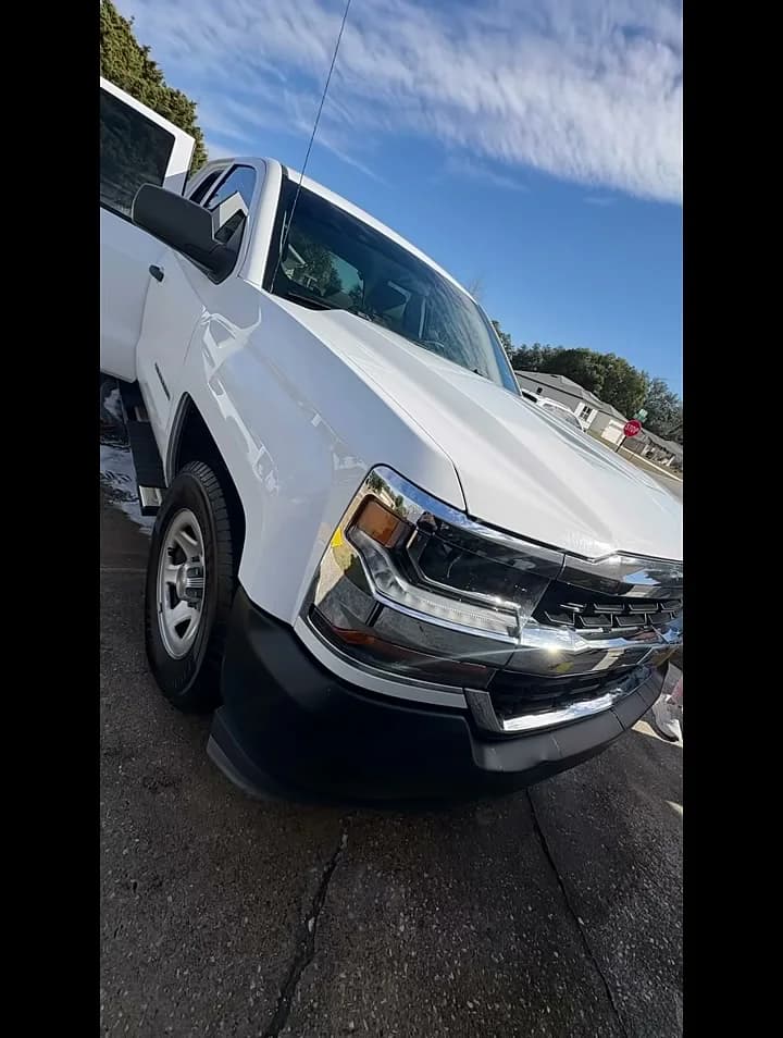 Finished white Silverado after detailing